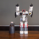 Illustration for article titled The Biggest Transformer Ever, Standing Next to Stuff